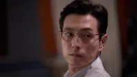 Jung Sung Il dalam film Murderer Report. (MIK Studio -Pluto Story Group - With a Studio via Soompi)