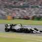 Pembalap Mercedes Lewis Hamilton beraksi pada balapan F1 GP Inggris di Sirkuit Silverstone, Minggu (14/7/2019). (AP Photo/Luca Bruno)