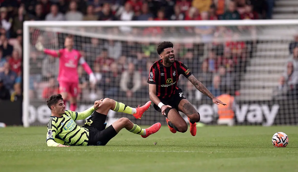 Arsenal menghajar tuan rumah Bournemouth 4-0 di pekan ketujuh Liga Inggris. (Robbie Stephenson/PA via AP)