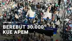 Ribuan warga di Boyolali berebut 30 ribu kue apem keong mas. Segala wadah dibawa, dari payung, kardus, hingga kerudung.
