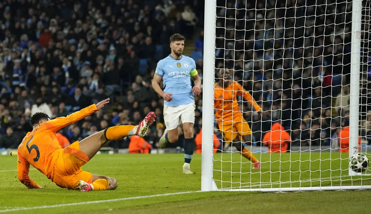 Pemain Real Madrid, Jude Bellingham mencetak gol kemenangan timnya ke gawang Manchester City dalam laga leg 1 babak playoff Liga Champions 2024/2025 di Etihad Stadium, Manchester, Inggris, Rabu (12/02/2025) WIB. (AP Photo/Dave Thompson)