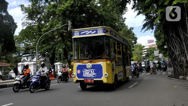 FOTO: Wisata Gratis Naik Bus Uncal di Bogor