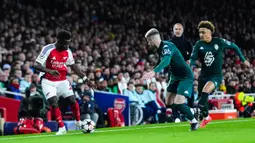 Kemenangan ini menjaga posisi Arsenal di peringkat tiga klasemen sementara Liga Champions, 13 poin dari 6 pertandingan. (AP Photo/Dave Shopland)