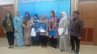 PT. TASPEN berikan Satuan ke Ahli wari Pegawai Negeri Sipil pemko Batam dan ASN (PPPK) Pemprov Kepri. (Liputan6.com/Ajang Nurdin)