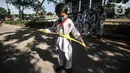 Murid Taekwondo Indonesia Manroe Club sebelum mengikuti latihan rutin di kawasan Kanal Banjir Timur (KBT), Jakarta Timur, Senin (16/8/2021). Pelatih atau Saboeum Manroe Club Erwin (45) mengatakan perguruan taekwondo itu biasa berlatih di GOR Matraman dan Cempaka Putih. (merdeka.com/Iqbal S. Nugroho)