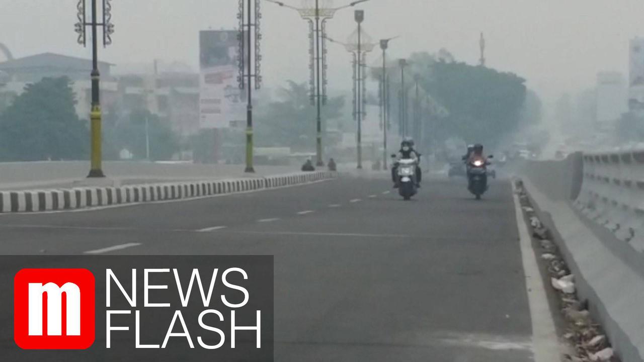 VIDEO: Sulit Bernapas Gara-Gara Kabut Asap
