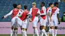 Striker AS Monaco, Kevin Volland (kedua dari kiri) melakukan selebrasi usai mencetak gol pertama timnya ke gawang Montpellier dalam laga lanjutan Liga Prancis 2020/21 pekan ke-20 di Mosson Stadium, Montpellier, Jumat (15/1/2021). AS Monaco menang 3-2 atas Montpellier. (AFP/Pascal Guyot)