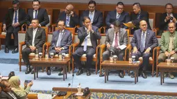 Menteri Keuangan Purbaya Yudhi Sadewa saat menghadiri rapat paripurna pengesahan Undang-Undang Pusat Finansial Internasional Indonesia (PFII) di Kompleks Parlemen, Senayan, Jakarta, Selasa (21/07/2026). (KLY/Arie Basuki)