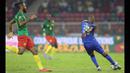 Comoros berhak lolos ke babak knock-out sebagai salah satu peringkat tiga terbaik. Sorotan untuk Comoros pun terus berlanjut, tetapi kali ini untuk berbagai hal yang tidak biasa. (AFP/Kenzo Tribouillard)