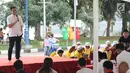 Ketua AMPG DKI Rob Clinton Kardinal memberikan sambutan dalam acara buka puasa bersama di Taman pluit, Jakarta Utara, Sabtu (2/5). Buka puasa ini diadakan oleh Angkatan Muda Partai Golkar (AMPG) DKI Jakarta. (Liptan6.com/Angga Yuniar)