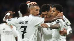 Bermain di stadion Santiago Bernabeu, Real Madrid sukses menghajar RB Salzburg dengan skor telak 5-1. (Pierre-Philippe MARCOU/AFP)