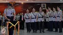 Irjen Pol Tito Karnavian (keempat kiri) saat mengikuti upacara serah terima jabatan di Mabes Polri, Jakarta, Jumat (12/6/2015). Irjen Pol Tito Karnavian resmi menjabat sebagai Kapolda Metro Jaya menggantikan Unggung Cahyono. (Liputan6.com/Johan Tallo)