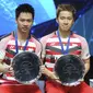 Ganda putra Indonesia, Kevin Sanjaya Sukamuljo/Marcus Fernaldi Gideon, menjadi juara All England 2018 setelah mengalahkan pasangan Mathias Boe/Carsten Mogensen pada partai puncak, Minggu (18/3/2018) atau Senin dini hari WIB. (AP/Rui Vieira).