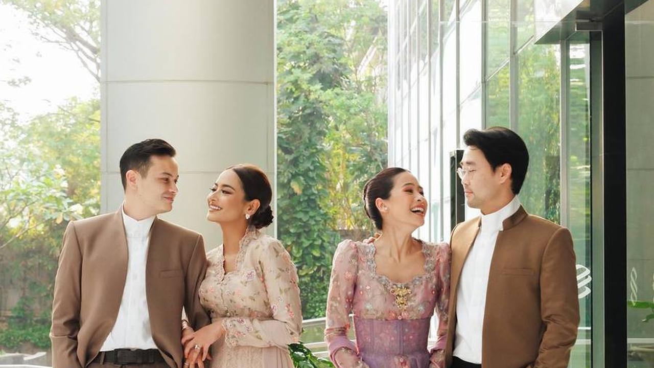 Menggunakan Kebaya Floral Hasil Desainer Yang Sama