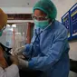 Pelaksanaan vaksinasi Covid-19 di Kota Surabaya (Dian Kurniawan/Liputan6.com)