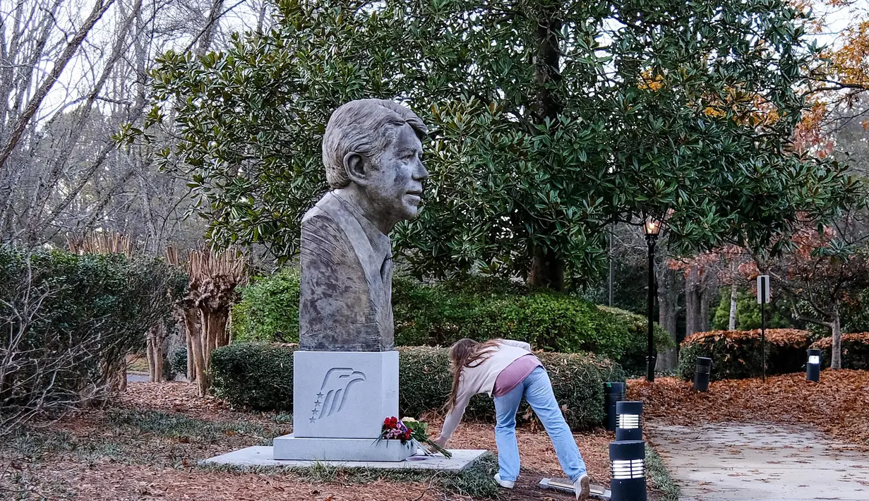 Jimmy Carter dikenang dalam komitmennya dalam menengahi Perjanjian Camp David antara Israel dan Mesir, serta komitmennya terhadap hak asasi manusia. (Alex Wroblewski/AFP)
