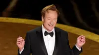 Conan O'Brien dalam Piala Oscar 2025. (KEVIN WINTER / GETTY IMAGES NORTH AMERICA / Getty Images via AFP)