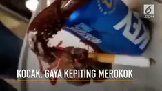 Tingkah aneh seekor kepiting merokok layaknya manusia terekam kamera.