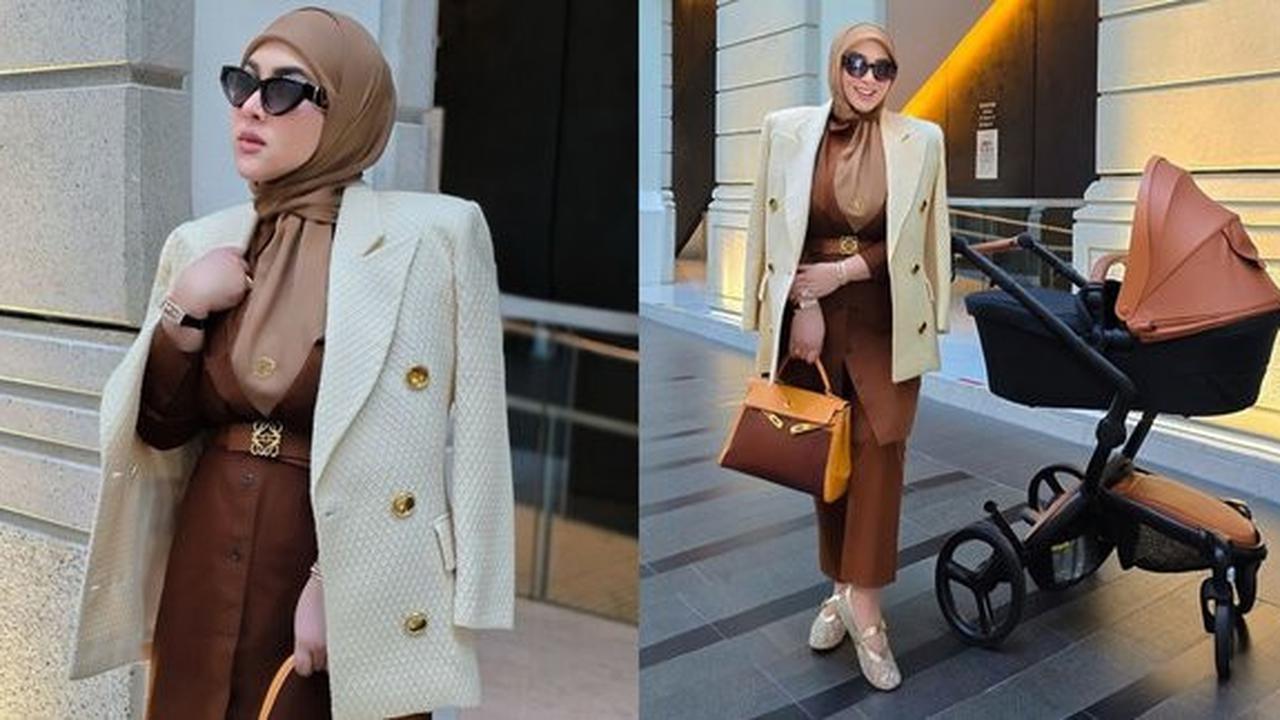 8 Foto Syahrini Menggendong Anak Sambil Membawa Tas Hermes, Tubuhnya Terlihat Langsing