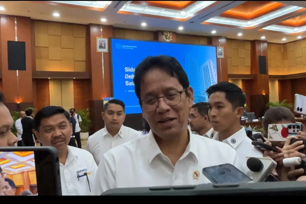 Menteri Keuangan (Menkeu) Purbaya Yudhi Sadewa usai Sidang Terbuka Satgas Debottlenecking, Senin (26/1/2026). (Liputan6.com/Gagas)