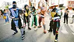 Sejumlah cosplayer berpose saat menghadiri San Diego Comic-Con International 2019 di San Diego, California, Amerika Serikat, Kamis (18/7/2019). (Matt Winkelmeyer/Getty Images/AFP)
