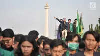 Mahasiswa gabungan se-Jabodetabek saat menggelar aksi unjuk rasa di depan Istana Merdeka, Jakarta, Selasa (16/7/2019). Dalam aksinya mereka mengecam pemerintah Jokowi atas hutang negara yang melonjak, politik dagang sapi, diskon pajak 300 persen, dan krisis penegakan HAM. (merdeka.com/Iqbal S. Nugro