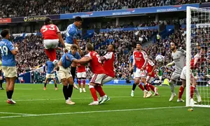 Gelandang Brighton Spanyol #14, Chema Andres, mencetak gol ketiga tim selama pertandingan Liga Inggris antara Brighton dan Hove Albion dan Arsenal di Stadion Komunitas American Express di Brighton, Inggris selatan pada 19 September 2026. (Glyn KIRK/AFP)