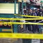 Tempat kejadian perkara penembakan di stasiun kereta bawah tanah Brooklyn, New York, Selasa (12/4/2022). (John Minchillo/AP)