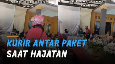 Momen bingung dialami oleh seorang kurir paket mengantarkan paket ke rumah pelanggan yang menggelar hajatan.