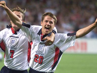 Michael Owen hingga kini masih tercatat sebagai pemain Timnas Inggris dengan dua rekor sekaligus yang dicatatkannya di Piala Dunia 1998. Rekor tersebut adalah sebagai pemain termuda dan sebagai pencetak gol termuda Timnas Inggris di ajang Piala Dunia. Mau lihat aksi-aksinya di Piala Dunia 1998 tersebut? Ini dia beberapa momennya. (AFP/Jacques Demarthon)