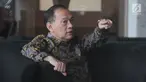 Mantan Menteri Keuangan Agus Martowardojo berada di ruang tunggu seusai menjalani pemeriksaan di Gedung KPK, Jumat (17/5/2019). Agus Martowardojo memenuhi panggilan KPK sebagai saksi kasus dugaan korupsi proyek e-KTP untuk tersangka anggota DPR Fraksi Golkar Markus Nari. (merdeka.com/Dwi Narwoko)