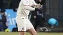 Bek AC Milan, Alessandro Florenzi berselebrasi usai mencetak gol ke gawang Empoli pada pertandingan Liga Serie A Italia di Stadion Carlo Castellani di Empoli, Italia, Kamis (23/12/2021). Kemenangan ini membuat AC Milan berada di posisi kedua klasemen dengan 42 poin. (Marco Bucco/LaPresse via AP)