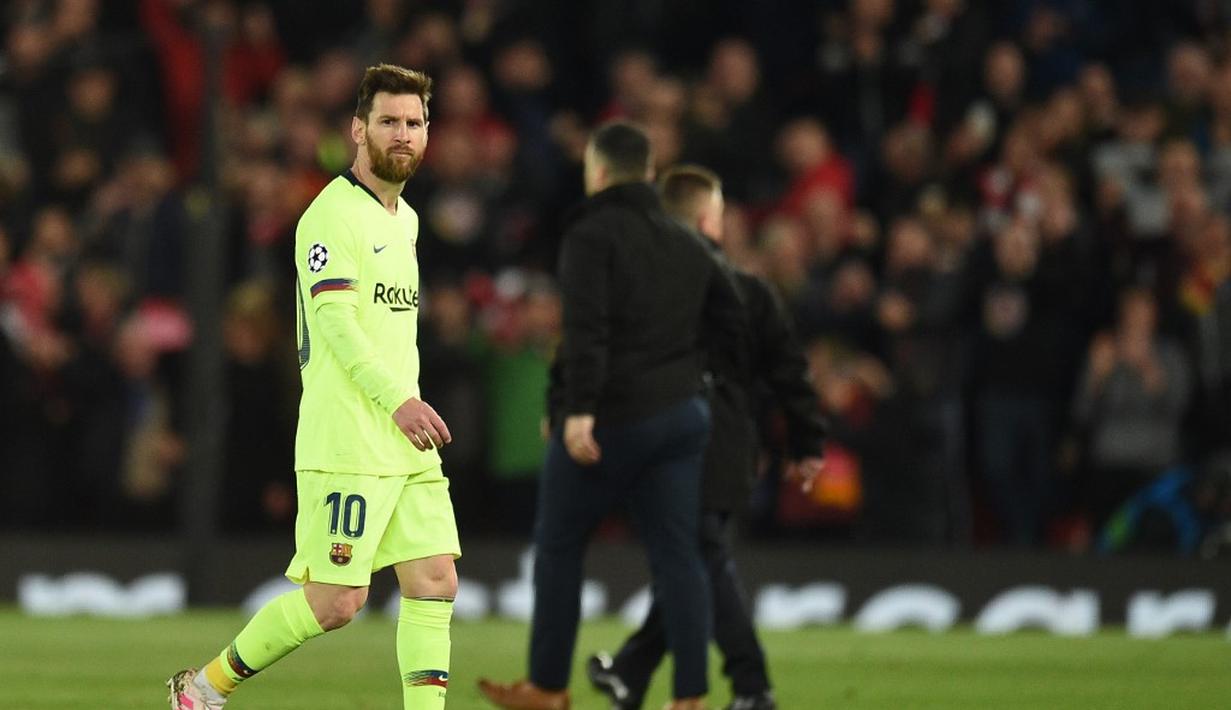 1. Lionel Messi (Barcelona) - 12 gol dan 3 assist (AFP/Oli Scarff)