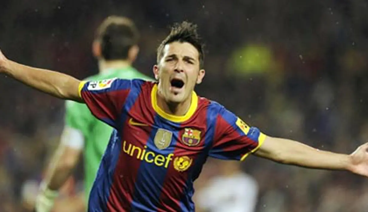 Selebrasi David Villa yang mencetak dua gol untuk membantu Barcelona mempermalukan Real Madrid 5-0 pada duel El Clasico di Nou Camp pada 29 November 2010. AFP PHOTO/JAVIER SORIANO