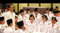 Jokowi bercerita di depan para Paskibraka bahwa ia pernah gagal ikut seleksi tingkat nasional untuk cabang olahraga renang, Jakarta, Rabu (20/8/2014) (Liputan6.com/Andrian M Tunay)