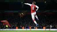 Pemain Arsenal Aaron Ramsey merayakan gol ketiga untuk timnya saat melawan CSKA Moscow pada pertandingan Liga Eropa di stadion Emirates, London (5/4). (AP Photo / Tim Ireland)