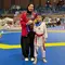 Tya Ariestya Dampingi Anak Kejuaraan Taekwondo di Korea, Kalundra Borong 2 Medali