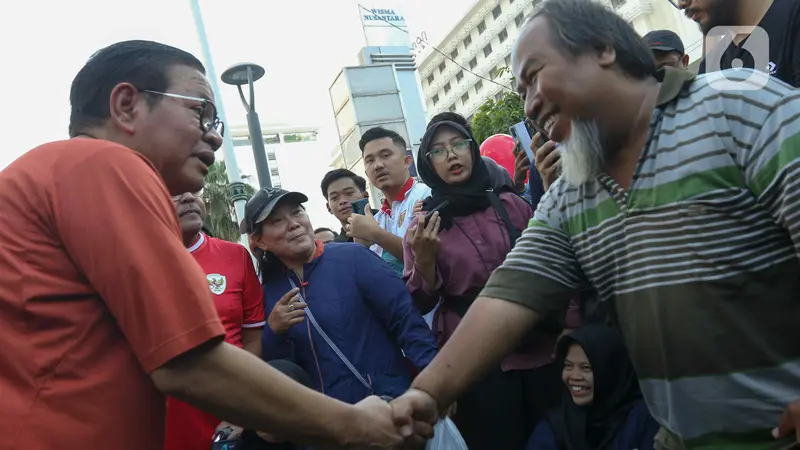 Pramono Anung dan Rano Karno berolahraga saat CFD