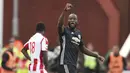 Striker Manchester United, Romelu Lukaku, melakukan selebrasi usai mencetak gol ke gawang Stoke City pada laga Premier League di Stadion bet365, Sabtu (9/9/2017). Manchester United bermain imbang 2-2 dengan Stoke City.(AP/Nick Potts)