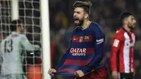 Bek Barcelona, Gerard Pique, merayakan gol yang dicetaknya ke gawang Athletic Bilboa pada laga Copa del Rey di Stadion Nou Camp, Barcelona, Rabu (27/1/2016). (AFP/Lluis Gene)