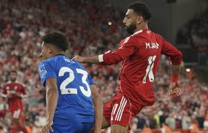 Mohamed Salah saat mencetak gol di laga Liverpool vs Bournemouth di Anfield, Sabtu (16/08/2025) dini hari WIB. (AP Photo/Ian Hodgson).