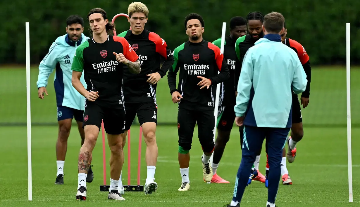 Sesi latihan Arsenal ini bagian persiapan menghadapi lanjutan pertandingan Liga Champions 2024/2025 melawan Paris Saint-Germain. (Glyn KIRK/AFP)