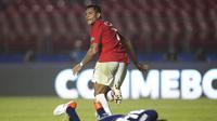 Ekspresi striker Timnas Chile, Alexis Sanchez, setelah menjebol gawang Jepang pada laga Copa America di Cicero Pompeu de Toledo Stadium, Sao Paolo, Selasa (18/6/2019) pagi WIB. (AFP/Miguel Schincariol)