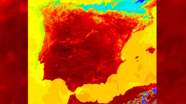 Penampakan serbuan gelombang panas di Spanyol sebagaimana difoto dari satelit NASA pada 1 Juli 2004. (Sumber Flickr/NASA/GSFC/Jacques Descloitres and Ana Pinheiro, MODIS Rapid Response Team)