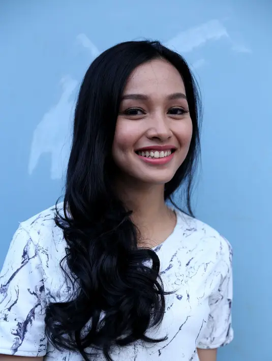 Wanita bernama asli Nurtria Wulandari ini berusia lebih muda dua tahun dari Asyaraf. (Andy Masela/Bintang.com)