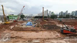 Suasana proyek pembangunan Pasar Rumput, Manggarai, Jakarta, Rabu (8/2). Proyek pasar ini ditargetkan selesai tahun 2018 mendatang. (Liputan6.com/Angga Yuniar)