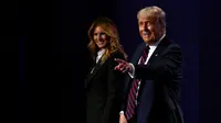 Melania dan Donald Trump dalam debat capres AS perdana. (dok. WIN MCNAMEE / GETTY IMAGES NORTH AMERICA / Getty Images via AFP)