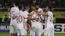 Para pemain Spanyol merayakan gol Diego Costa saat melawan Makedonia pada kualifikasi Piala Dunia 2018 grup G di Philip II National Stadium, Skopje, MaKedonia, (11/6/2017). (AP/Boris Grdanoski) 