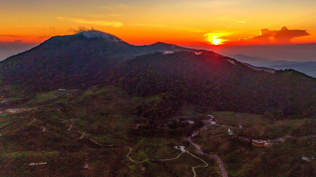 FOTO: Pesona Alam Puncak Masih Menjadi Tujuan Favorit Warga Saat Libur Panjang