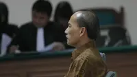 Salah satu eksepsi yang diajukan antara lain jika dirinya tidak dapat dipidana  sesuai dengan Pasal 45 UU BI (Liputan6.com/Herman Zakharia)